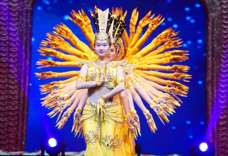 The Woman With Many Arms | Getty Images Photo by Ji Chunpeng/Xinhua 