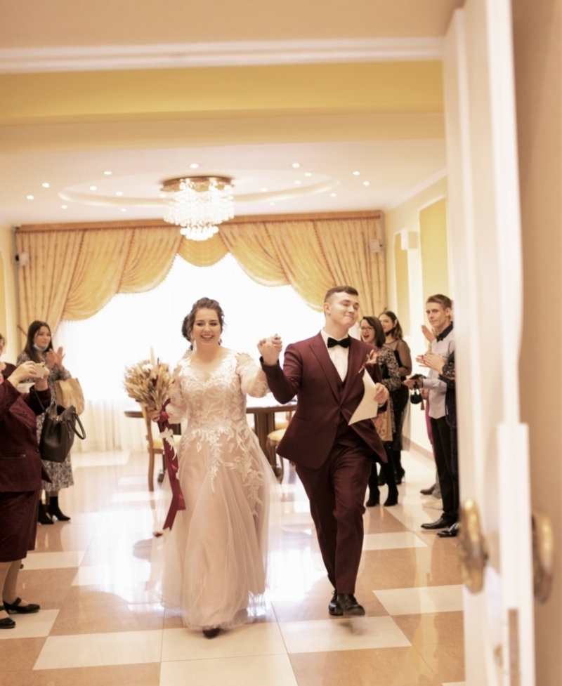 A Special Dance While Going Down the Aisle | Adobe Stock Photo By Heppik