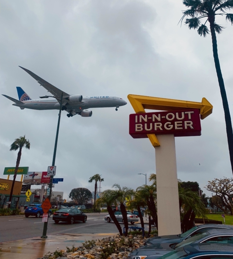 Watching Planes at In-N-Out | Alamy Stock Photo