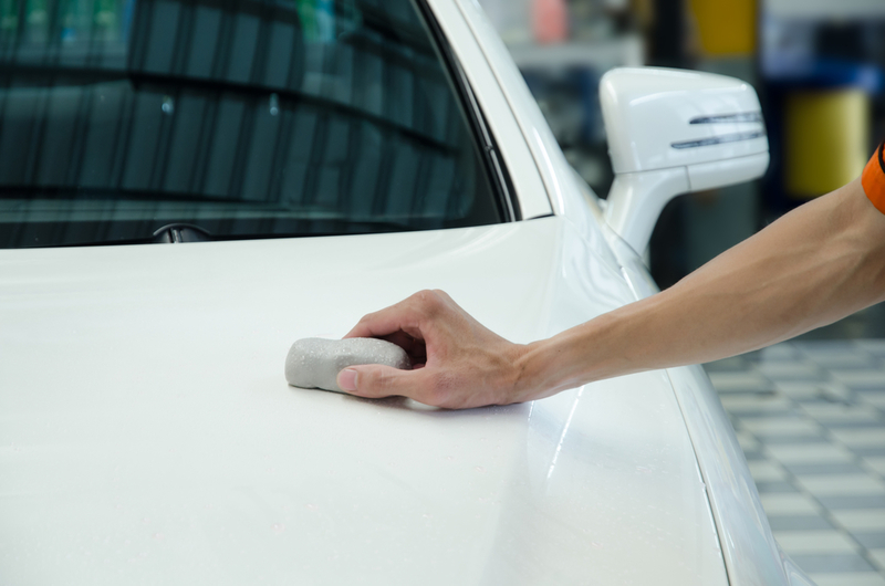 Use a Clay Bar to Remove Stubborn Grease Stains | Shutterstock Photo by Jitchanamont