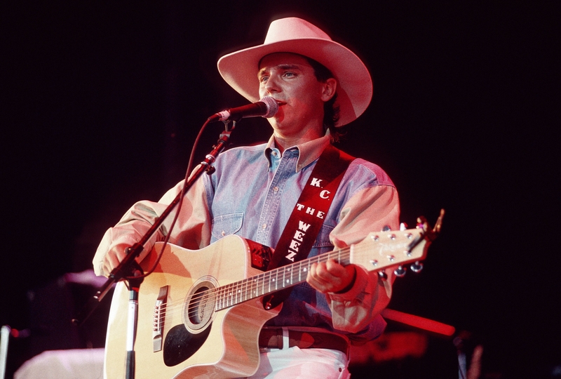 Kenny Chesney Then | Getty Images Photo by Beth Gwinn/Redferns