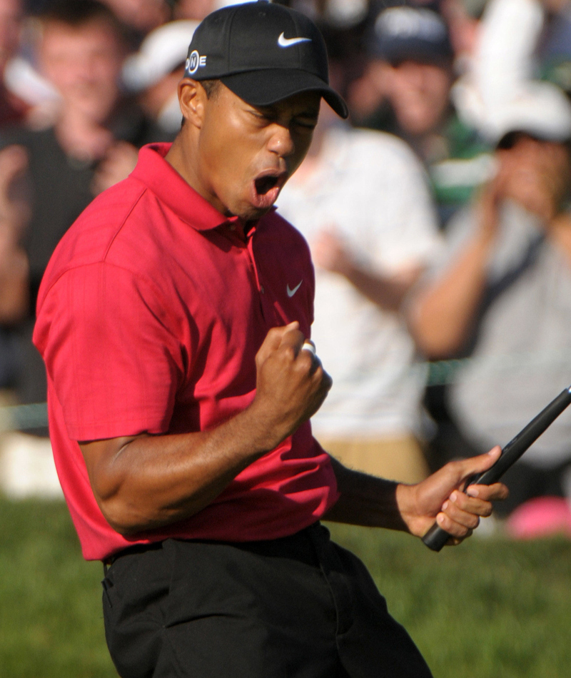 Sinking a Putt for Birdie | Alamy Stock Photo by UPI Photo/Earl Cryer