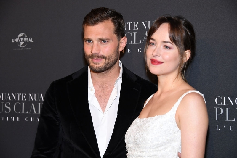 Dakota Johnson vs. Jamie Dornan | Getty Images Photo by Pascal Le Segretain