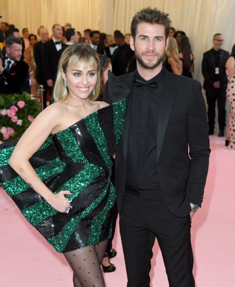 Miley Cyrus and Liam Hemsworth | Getty Images Photo by Karwai Tang