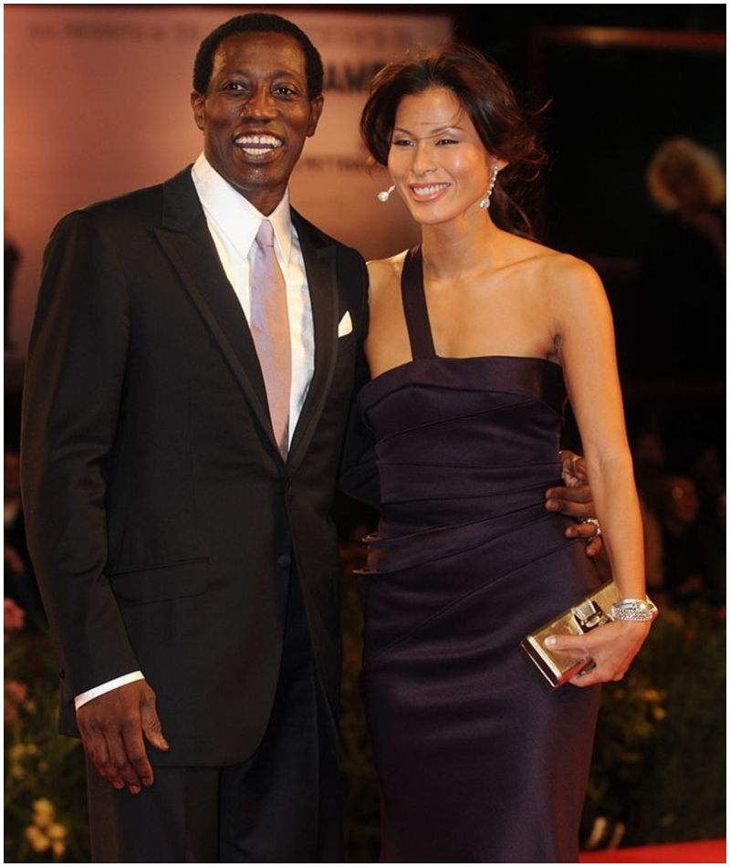 Nikki Park and Wesley Snipes | Getty Images Photo by Pool CATARINA/VANDEVILLE/Gamma-Rapho