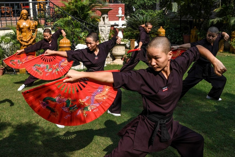 Kung Fu Nuns | Getty Images Photo by SAJJAD HUSSAIN/AFP