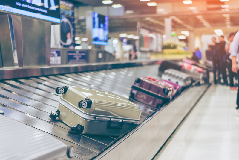 Get Your Bag First | Shutterstock Photo by Travel man