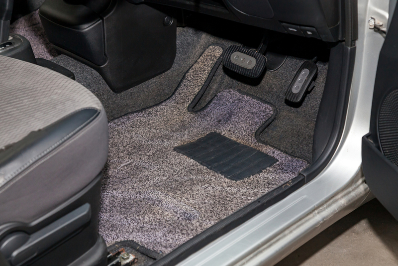 Cleaning Your Car’s Floor Mats | Shutterstock