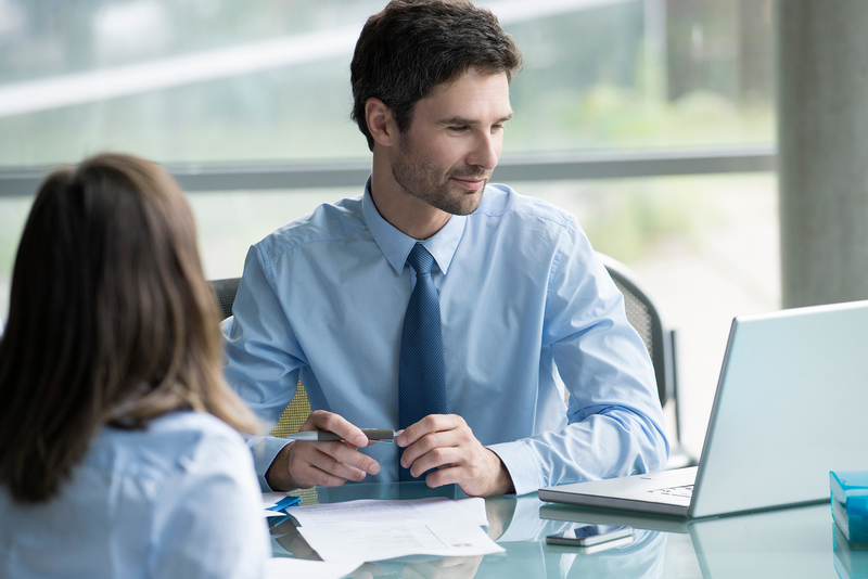 Insurance Sales Agents | Alamy Stock Photo by PhotoAlto/Eric Audras