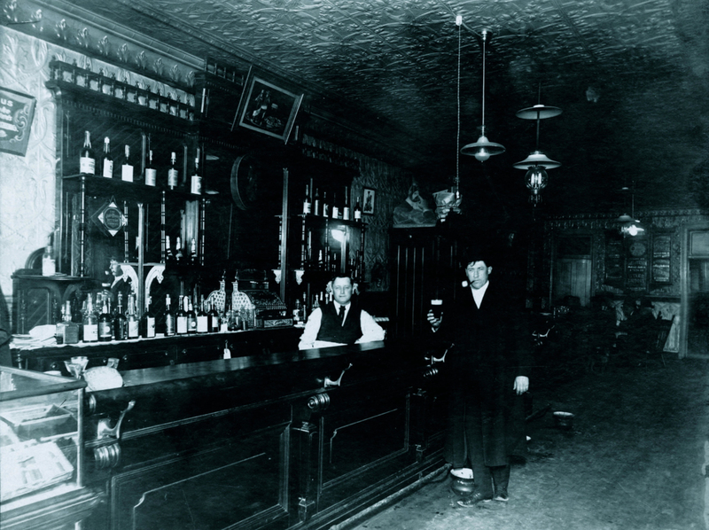 Men Shared Bar Towels | Alamy Stock Photo by The Protected Art Archive